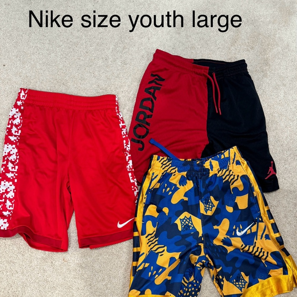 3 pairs Nike youth boys shorts size large.